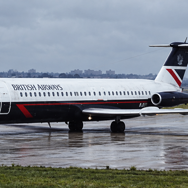 Editorial reconstruction of a BAC One-Eleven cockpit exterior with the captain side windscreen panel missing from its bolt-hole retainer frame on wet airport tarmac